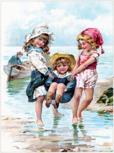 children playing at the ocean together